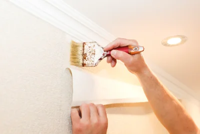 Pose de papier peint aux Assions — revêtements muraux et toiles de verre